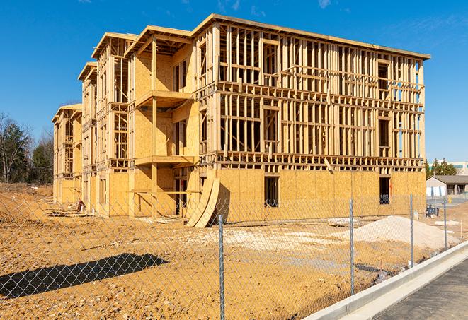 a snapshot of temporary chain link fences protecting a large construction project from unauthorized access in Rushville